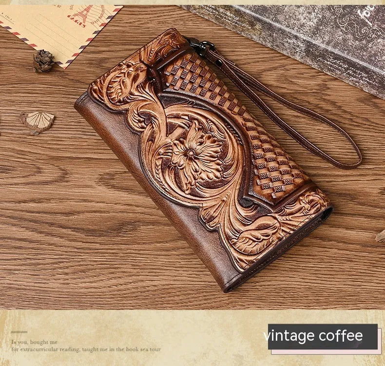 Retro brown Chinese floral embossed tri-fold women's leather wallet open to show compartments.