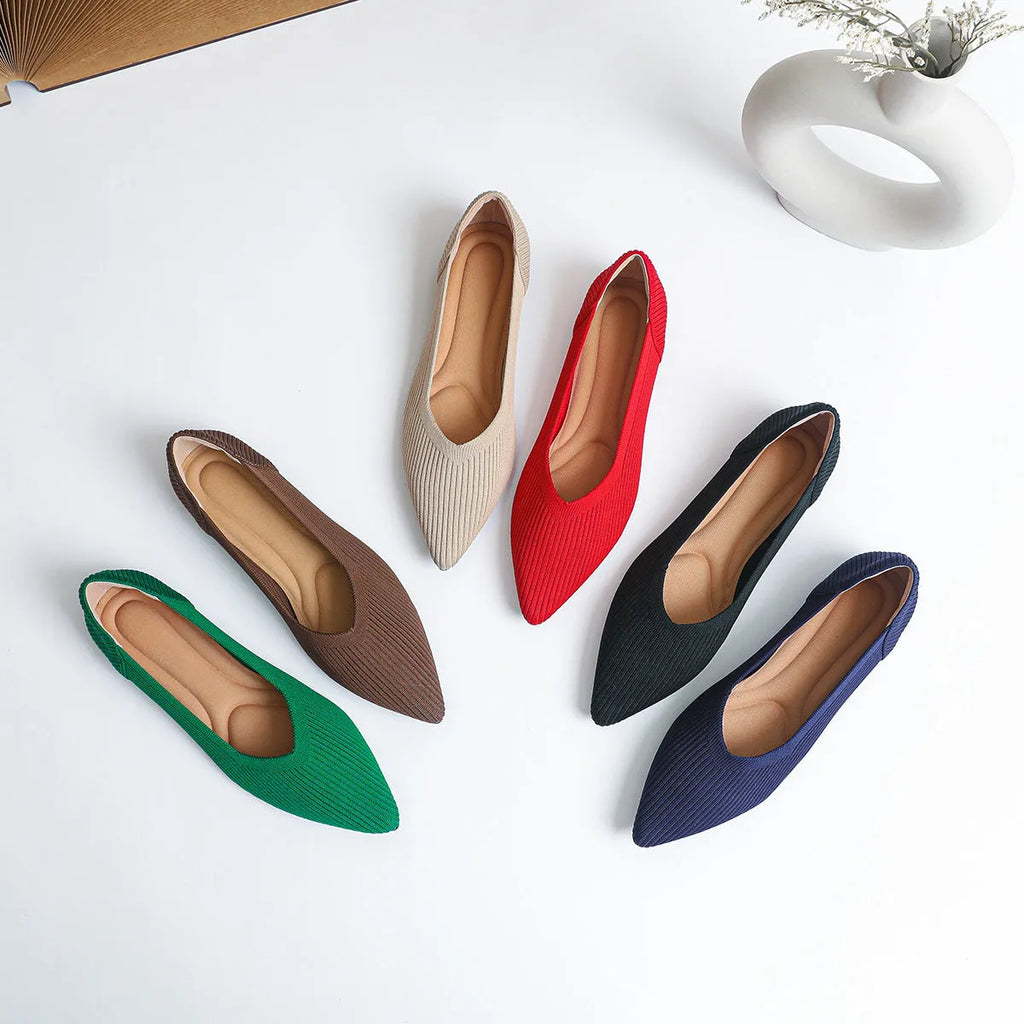 Women's apricot knit pointed toe flat ballet pumps with a rubber sole, shown from the side.