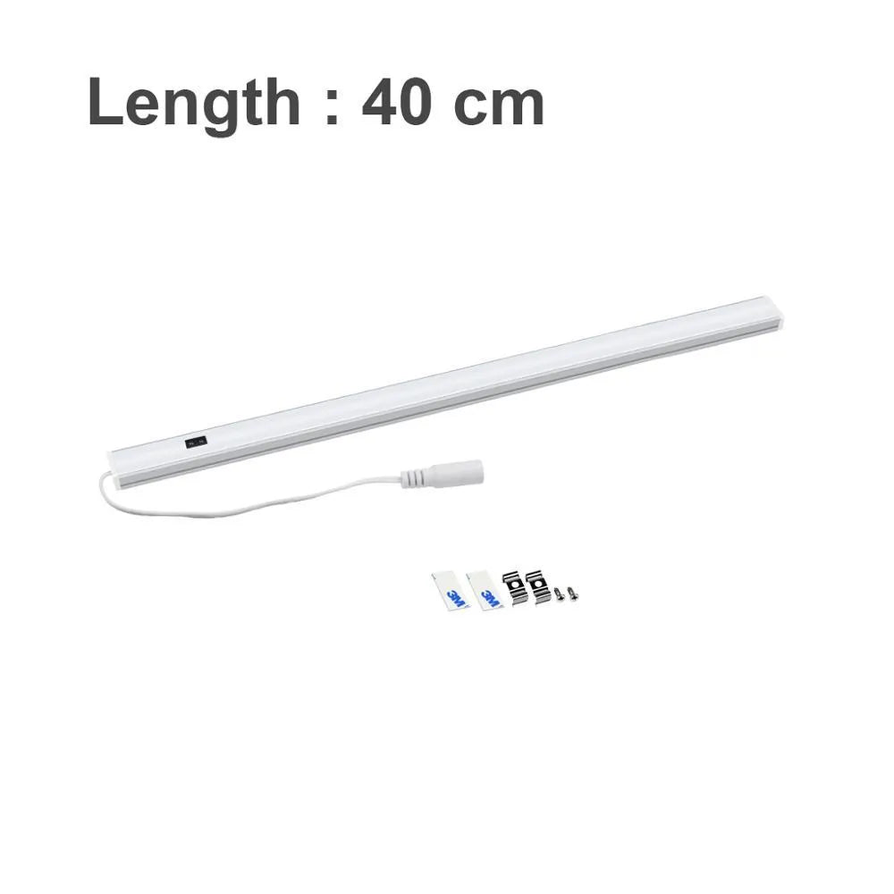 Slim aluminium profile DC LED strip bar light for cabinet or shelf mounting.
