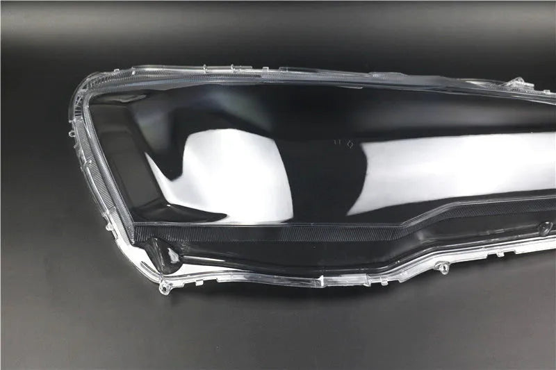 Transparent plastic car headlight housing cover showing clear construction and 50x30x20mm dimensions