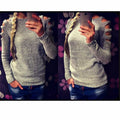 Women's grey crocheted hollow-out long-sleeve pullover shirt laid flat.