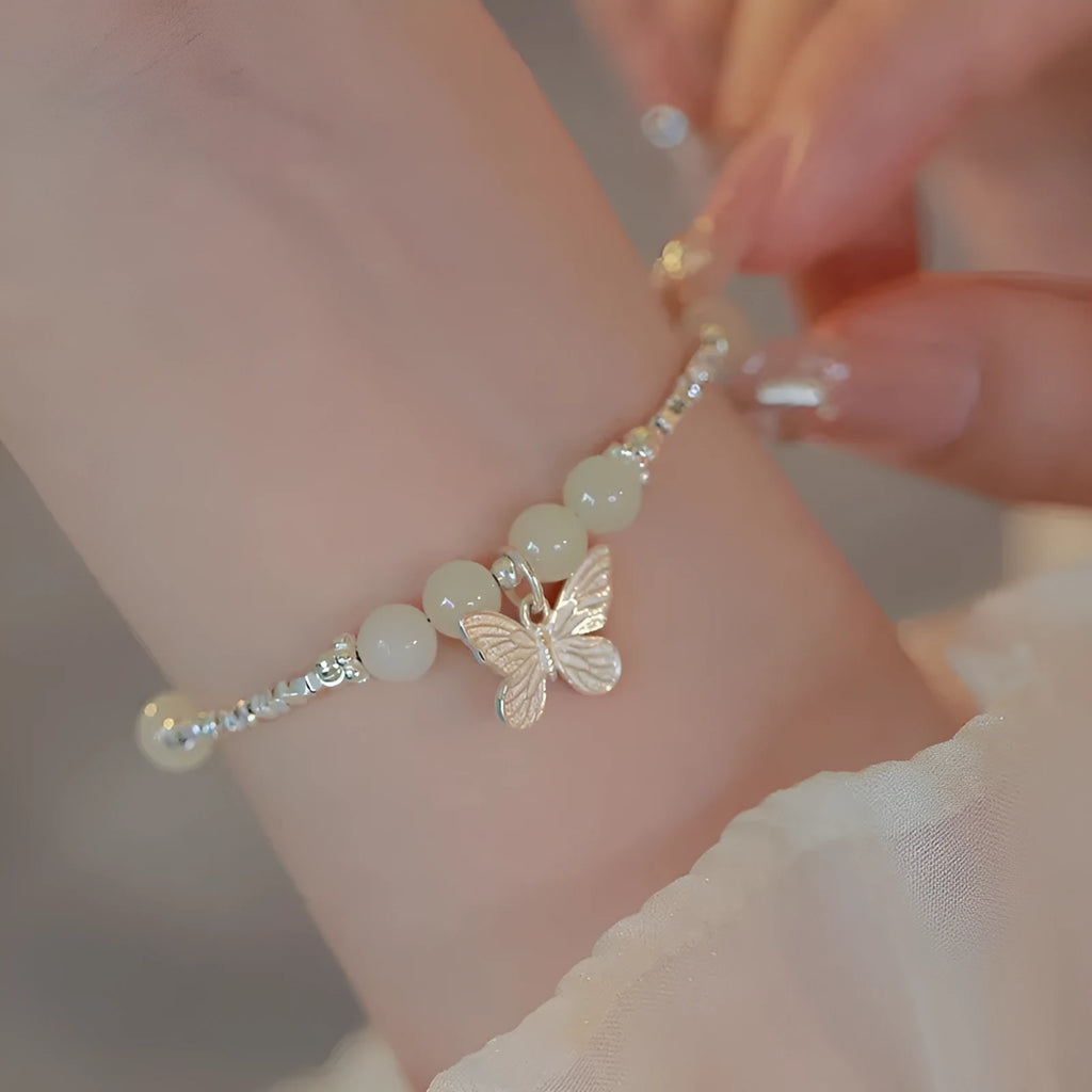 Hetian jade bracelet and necklace set for women with silver butterfly charms on electroplated copper chains