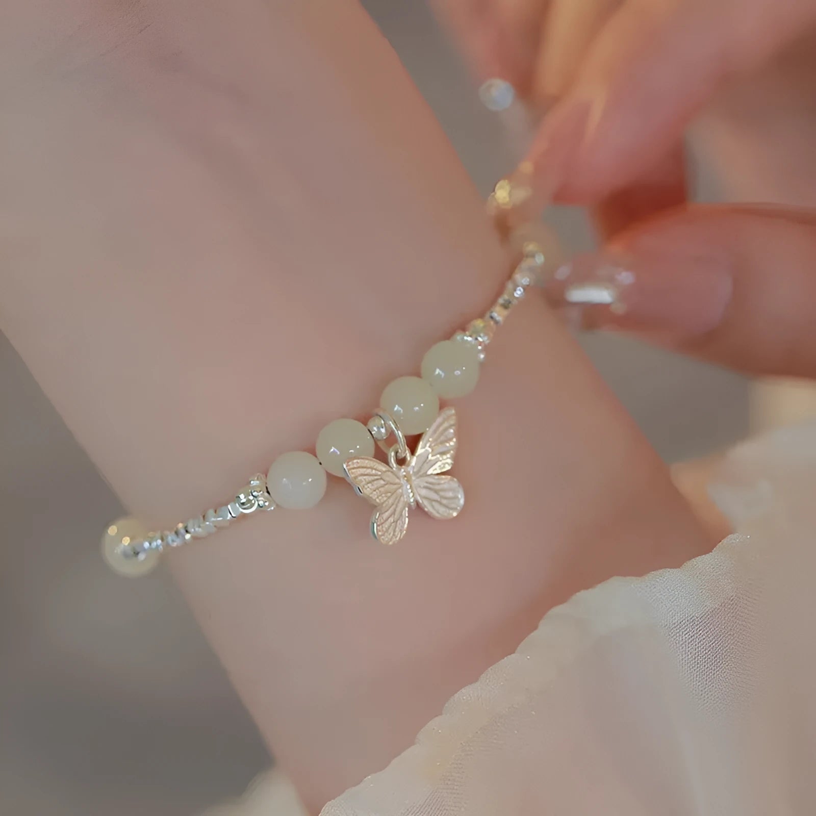 Hetian jade bracelet and necklace set for women with silver butterfly charms on electroplated copper chains