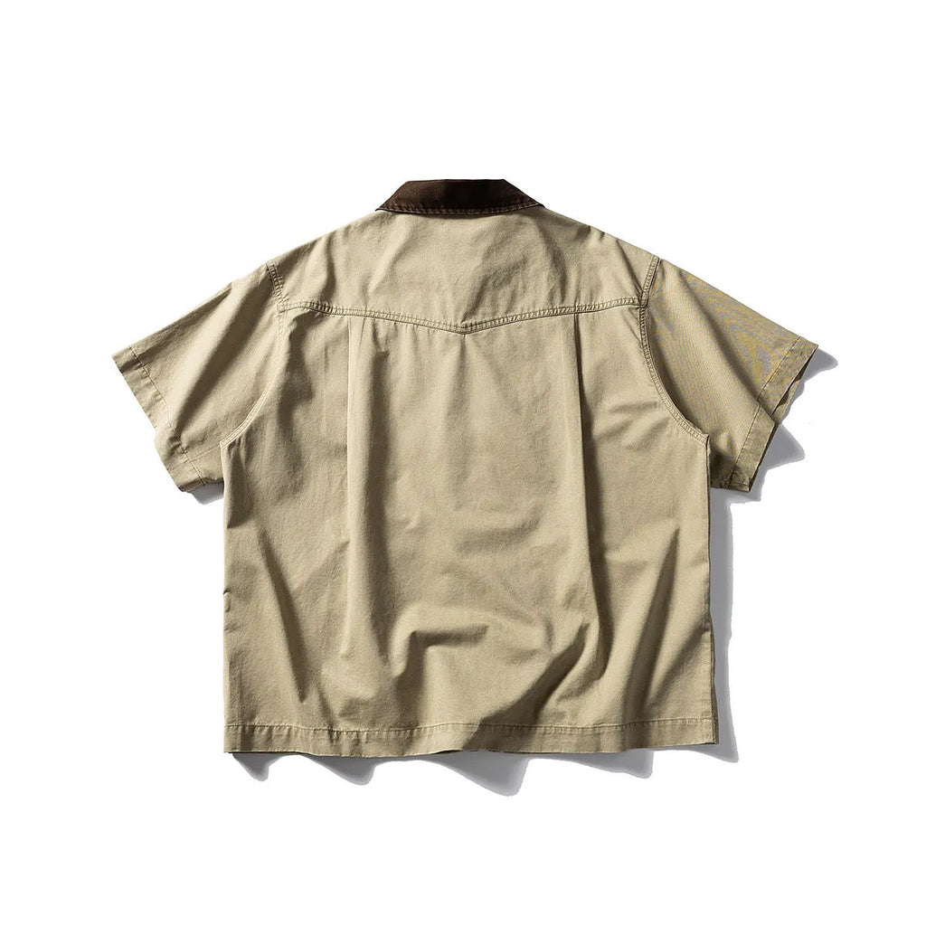 Grey loose-fit washed overalls short sleeve cardigan shirt on a hanger