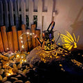 Pastoral style tapered butterfly solar garden lamp made of iron.