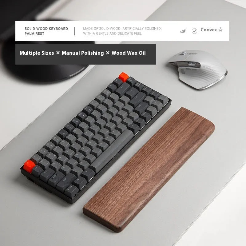Black walnut wooden keyboard palm rest with wrist strap, 440mm long, on a desk