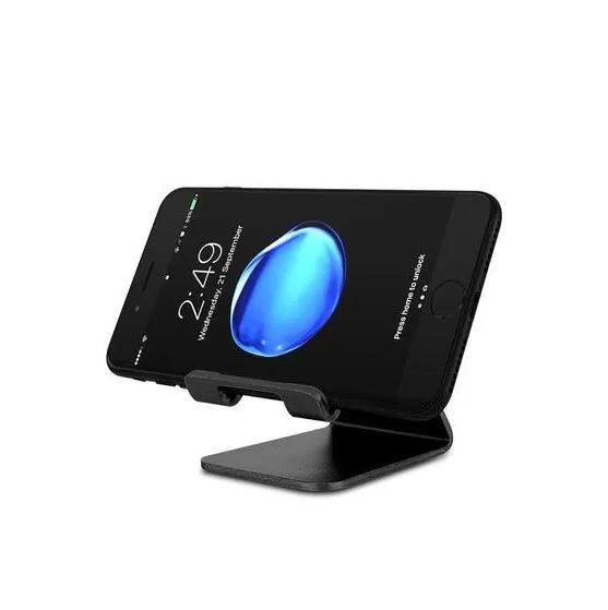 Aluminium alloy foldable tablet stand in gold holding a smartphone on a desk