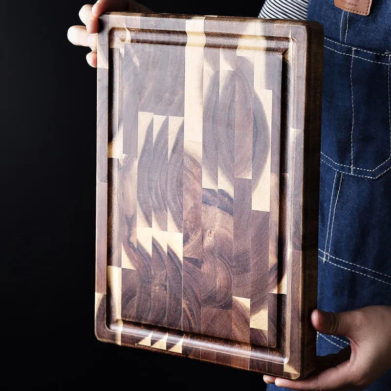 Brown solid wood cutting board with parquet pattern, 3cm thick, on kitchen counter