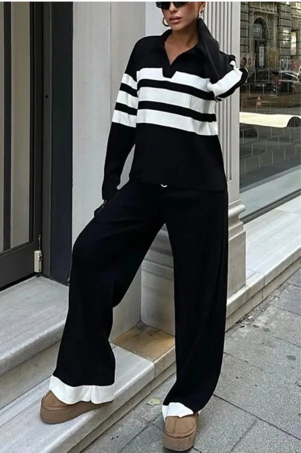 Women's black and white striped polo collar knit two-piece set with matching trousers