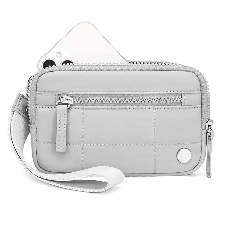 Waterproof quilted women's handbag with transparent deck section in solid colour
