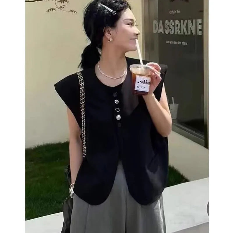 Women's beige loose-fit polyester vest with a pocket, shown on a hanger.