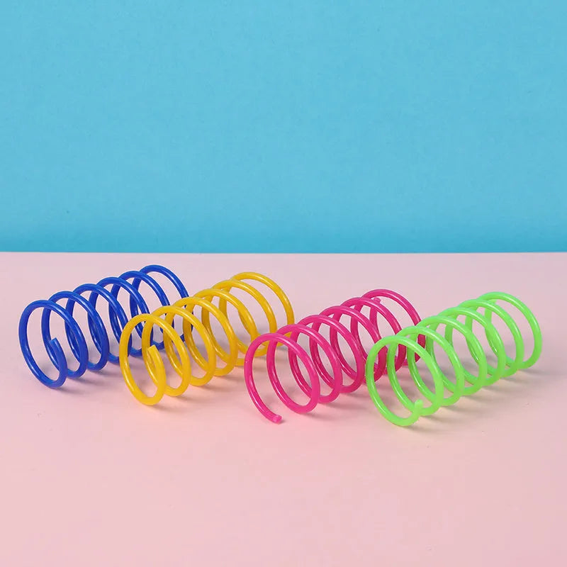 Mixed colour plastic cat spring toys measuring 5.5cm long for kitten and cat play