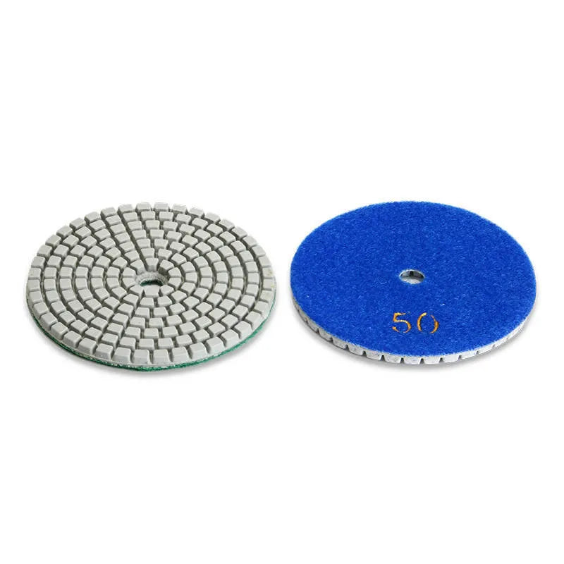 Set of 10 emery stone polishing pads showing 80mm diameter discs with central mounting holes