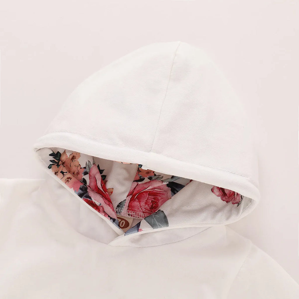 White 100% cotton hooded playsuit for a baby, showing long sleeves, trousers, and pullover neck.