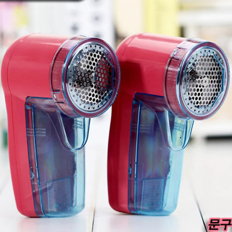 Portable electric lint remover device for removing pills from clothing and sweaters