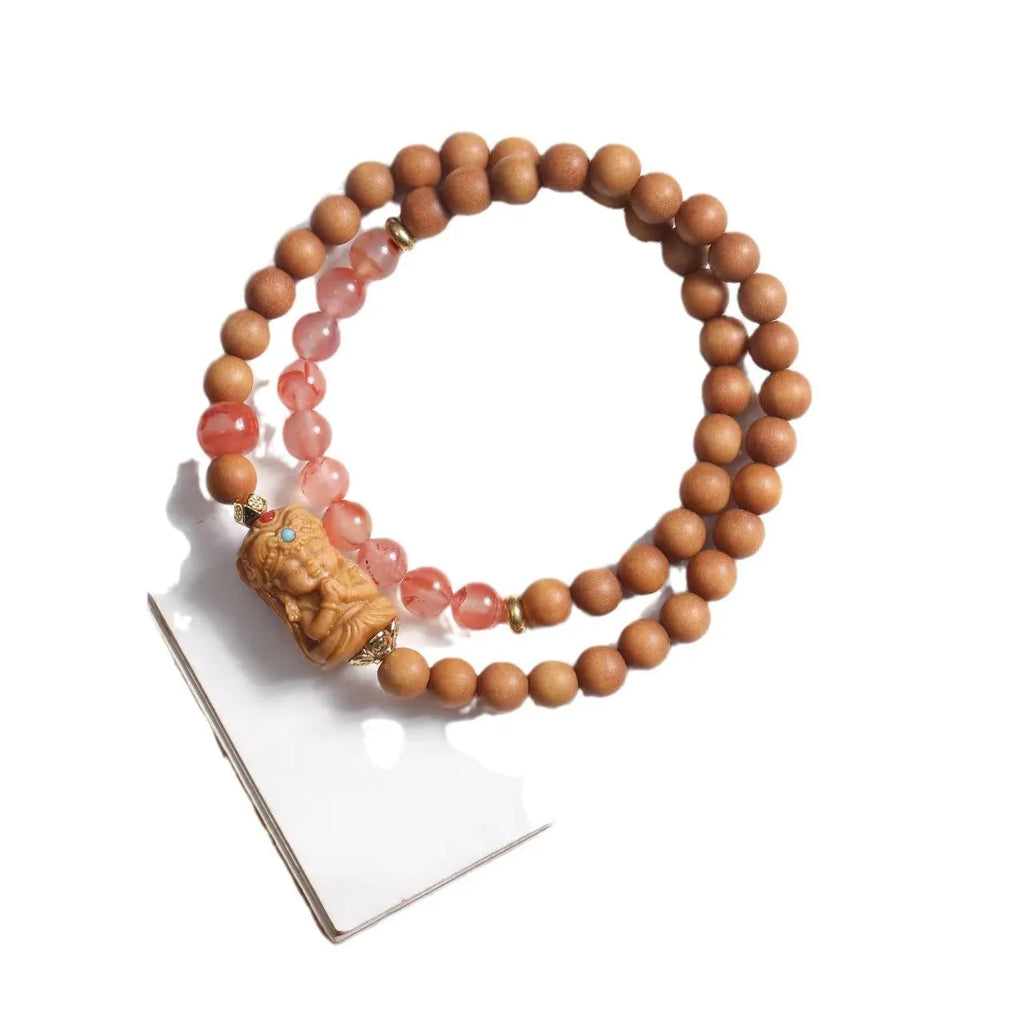 Brown sandalwood bracelet with South Red Zachilam patterns and 6mm round wooden beads