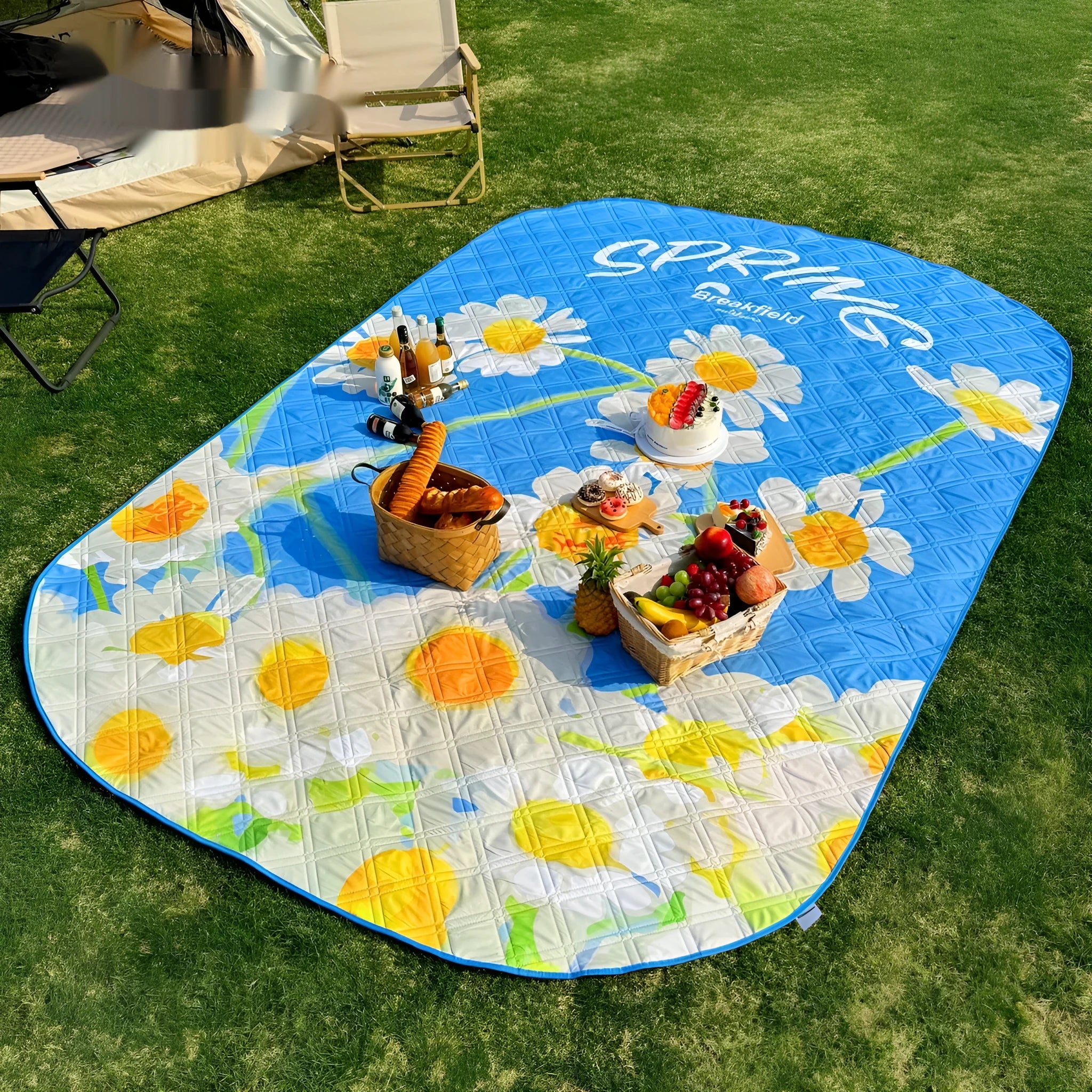 Large waterproof outdoor picnic mat showing seasonal colour option on grass