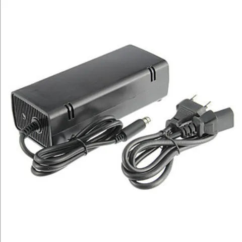 Black Xbox 360 E AC power adapter with detachable cable and UK/EU/US plug options