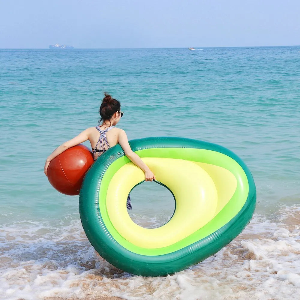 Large green inflatable avocado-shaped pool float measuring 169cm long
