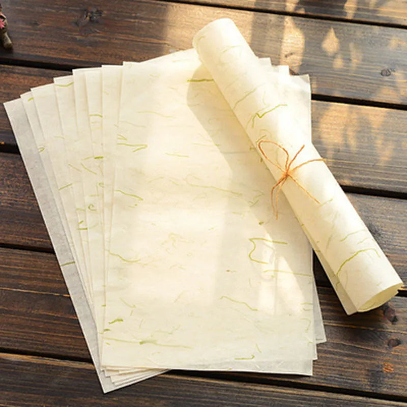 Ten sheets of ancient Chinese style painting paper for calligraphy in Green Leaf, Green Silk, Safflower, and Yellow Flower colours.