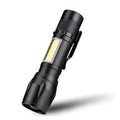 Black mini aluminium alloy telescopic LED torch with clip, shown zoomed in and out.