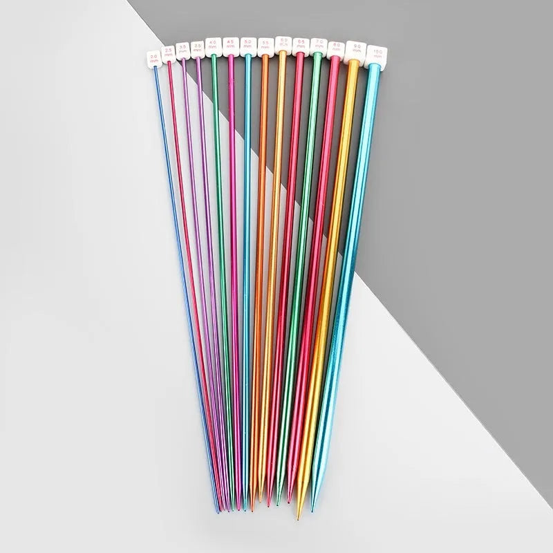 Set of lengthened crochet hooks with protective end caps in multiple sizes from 2.0mm to 10.0mm.