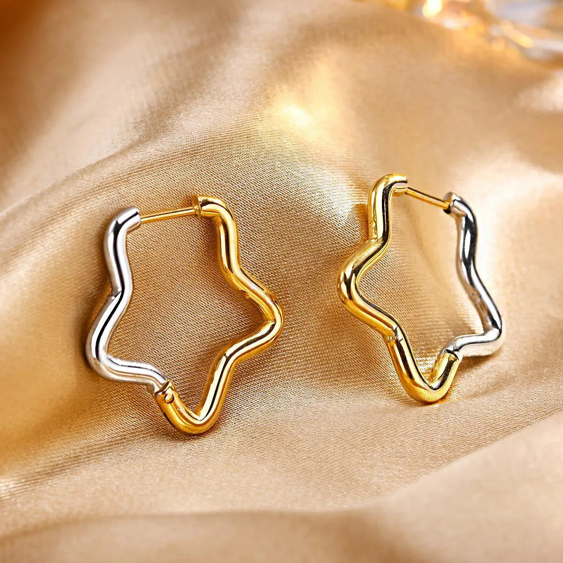 Set of four titanium steel gradual gold geometric earrings: square, triangle, love, pentagram