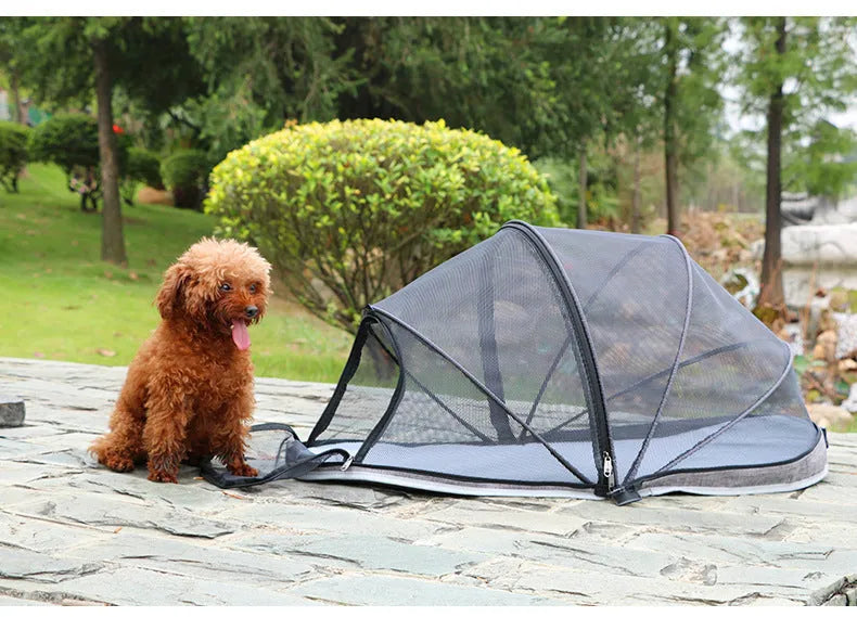 Portable folding cat tent with half-mesh side in blue, set up on a floor.