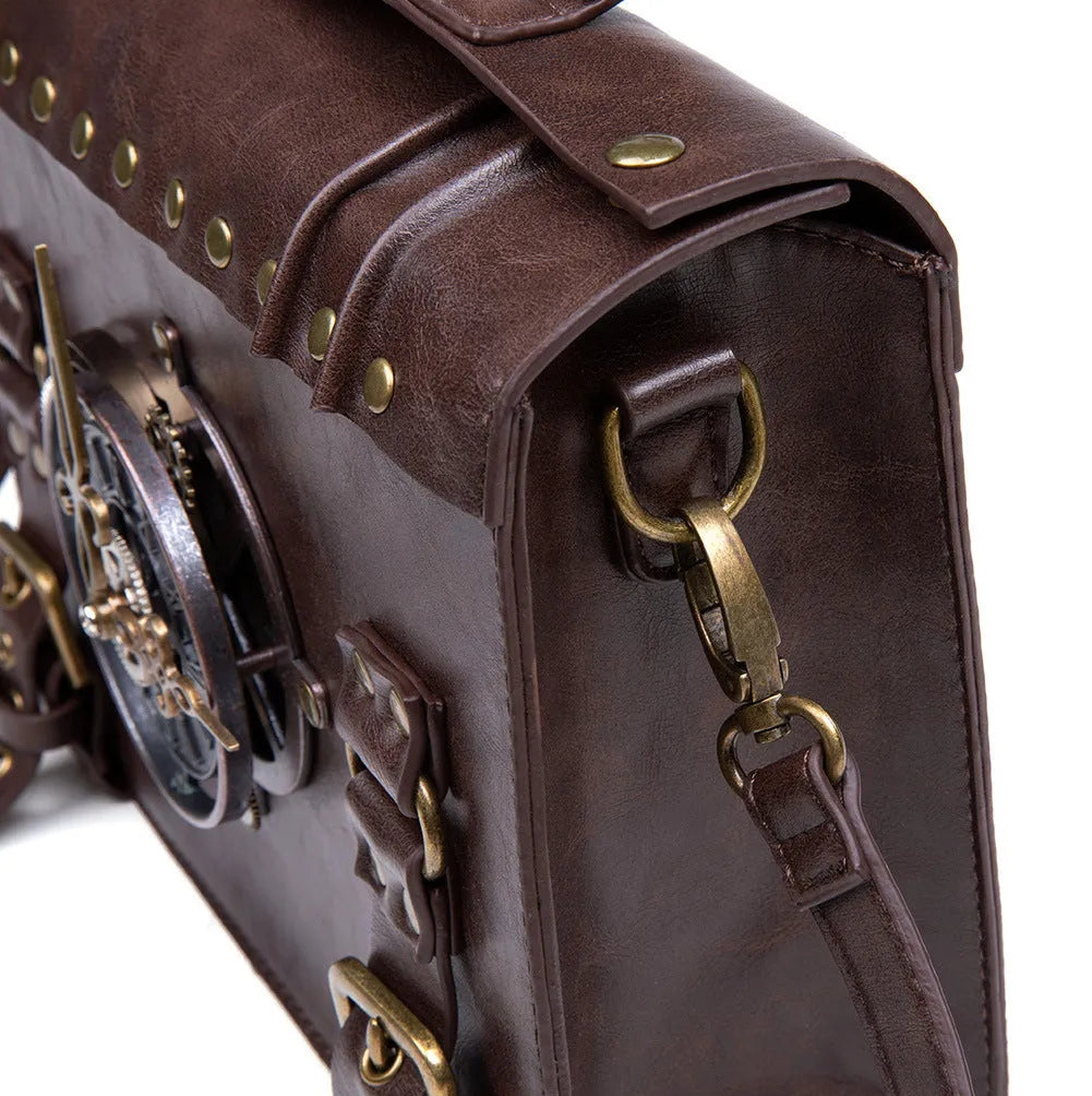 Bronze steampunk industrial retro style shoulder bag with metal hardware on a horizontal square pillow shape