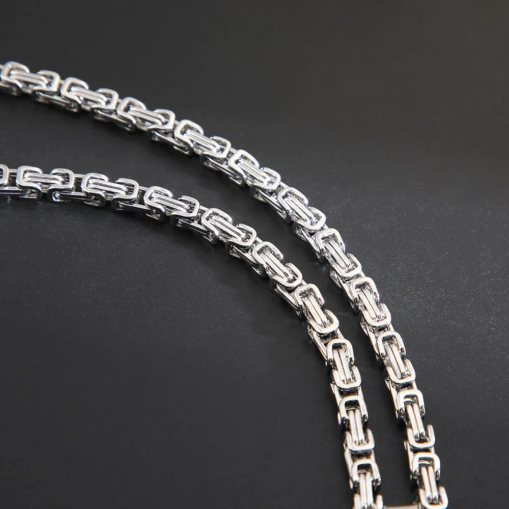 Men's titanium steel water ripple pendant necklace on an adjustable Emperor Chain in black finish.
