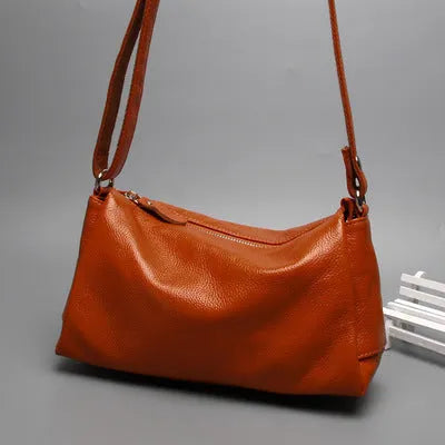 Women's genuine leather crossbody bag in horizontal square design with three-dimensional pocket
