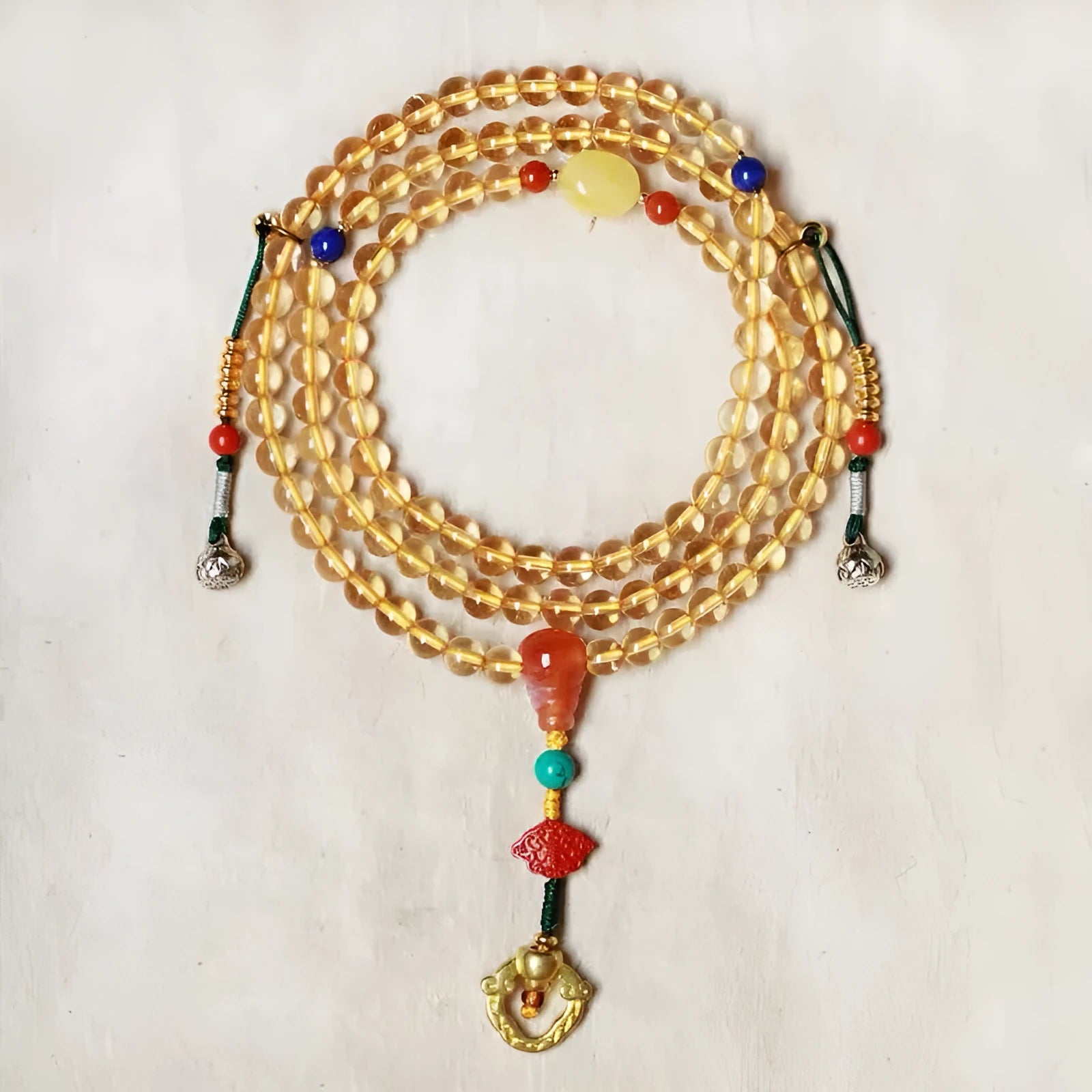 Brazil natural citrine bracelet with 1mm yellow beads on filament string