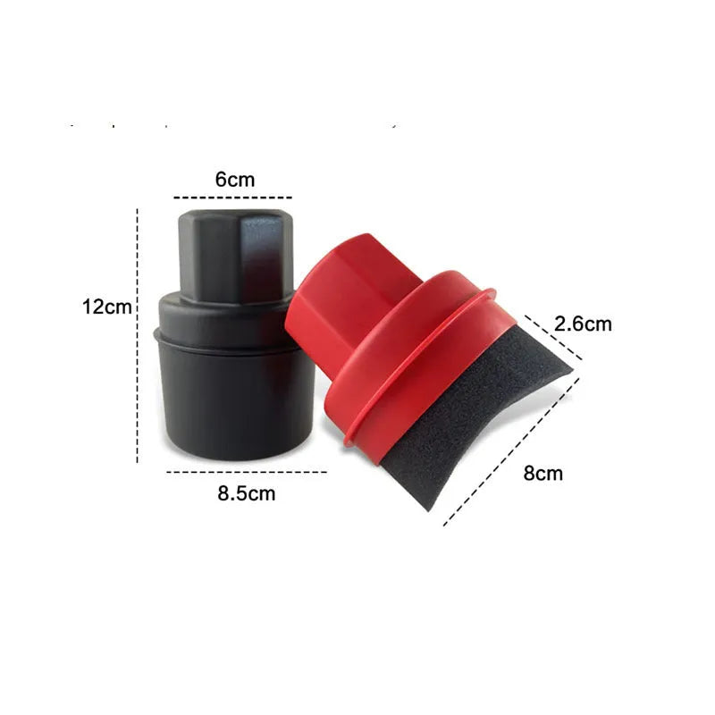 Black and red tyre oil sponge brushes with lids on a white background.