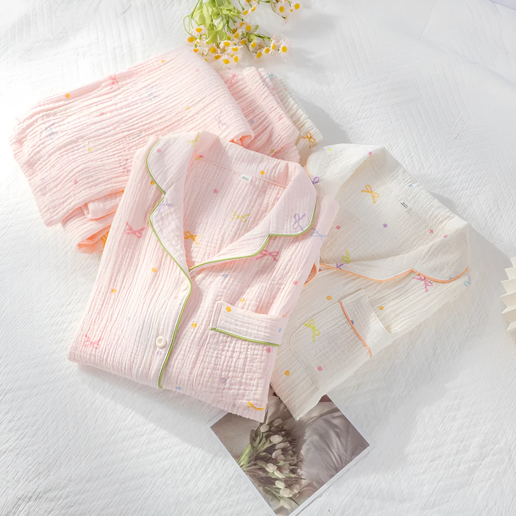 Women's cotton pajama set in pink or beige with long sleeves and matching trousers
