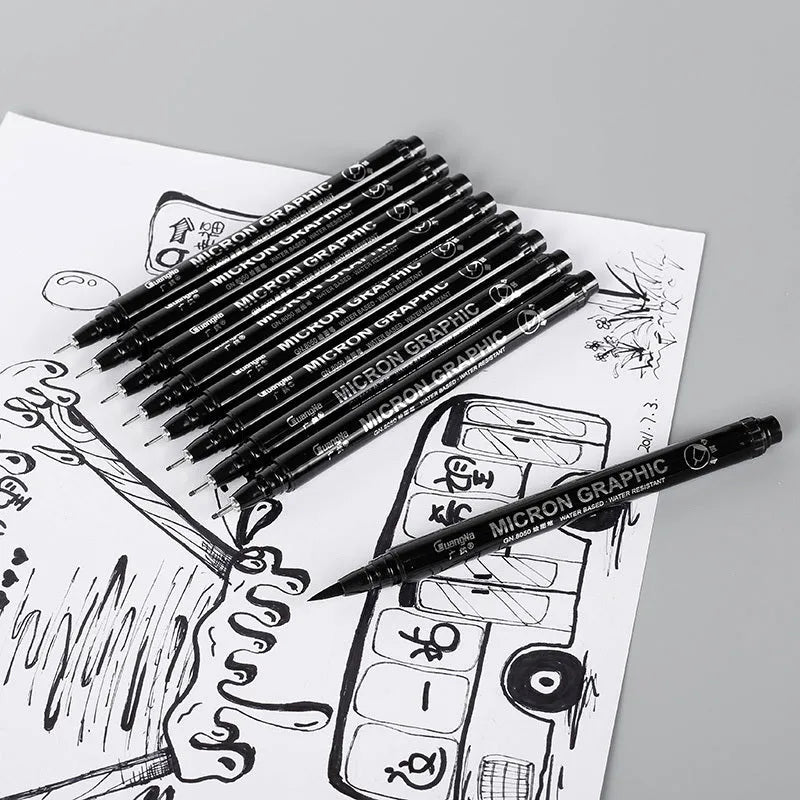 Set of 12 black comic art pens with 9 microtip nib sizes in storage organiser for detailed drawing