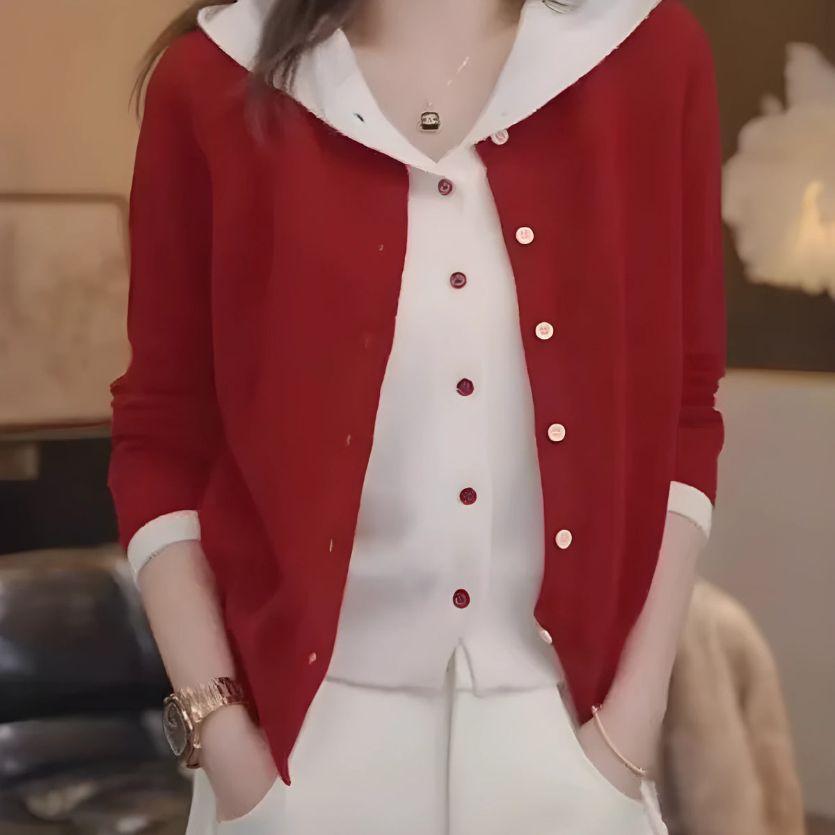 Women's long sleeve knit cardigan in pink with false two-piece design and colour contrast
