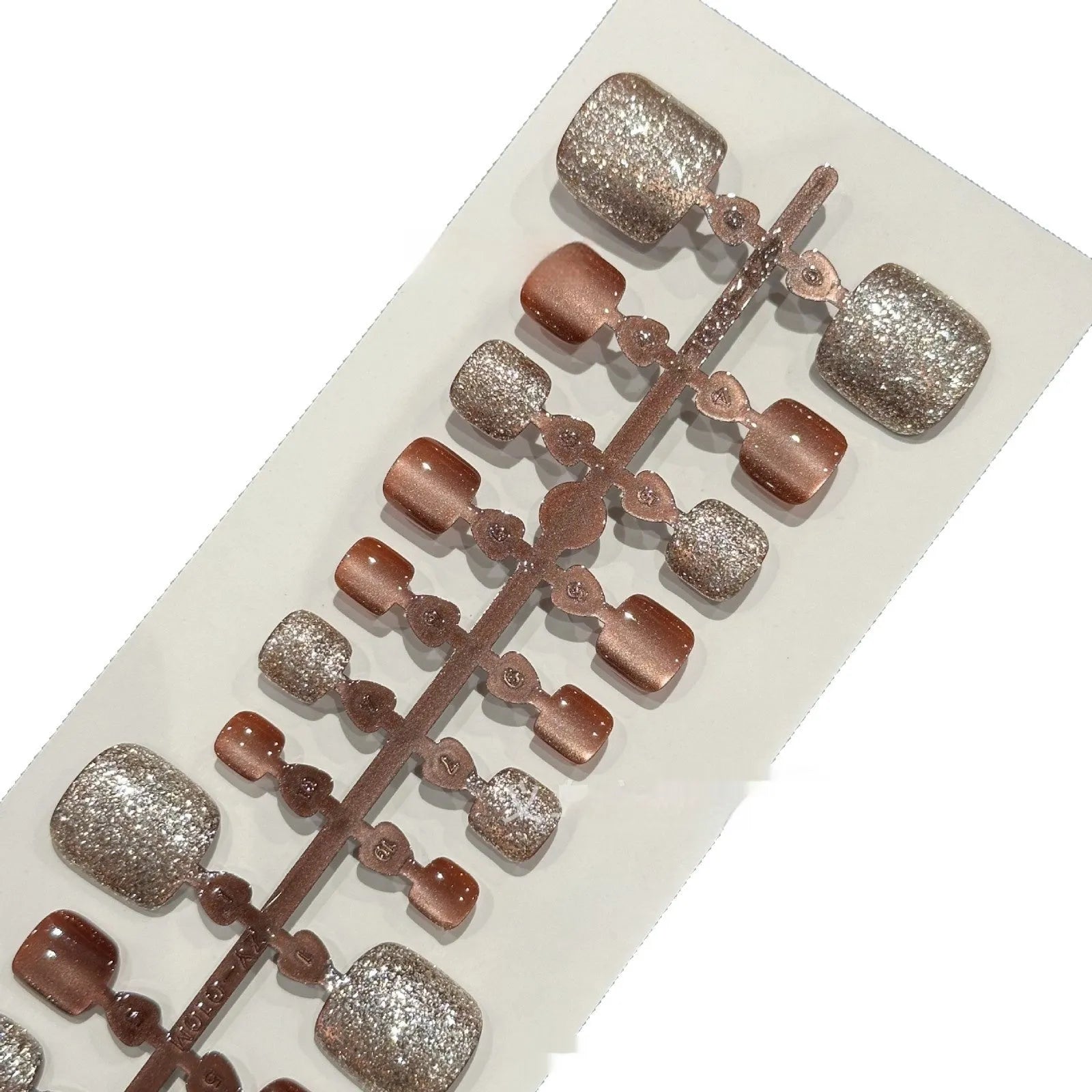 Brown crystal cat eye rhinestone toenail wear patch set with 42 pieces in three sizes on a white background
