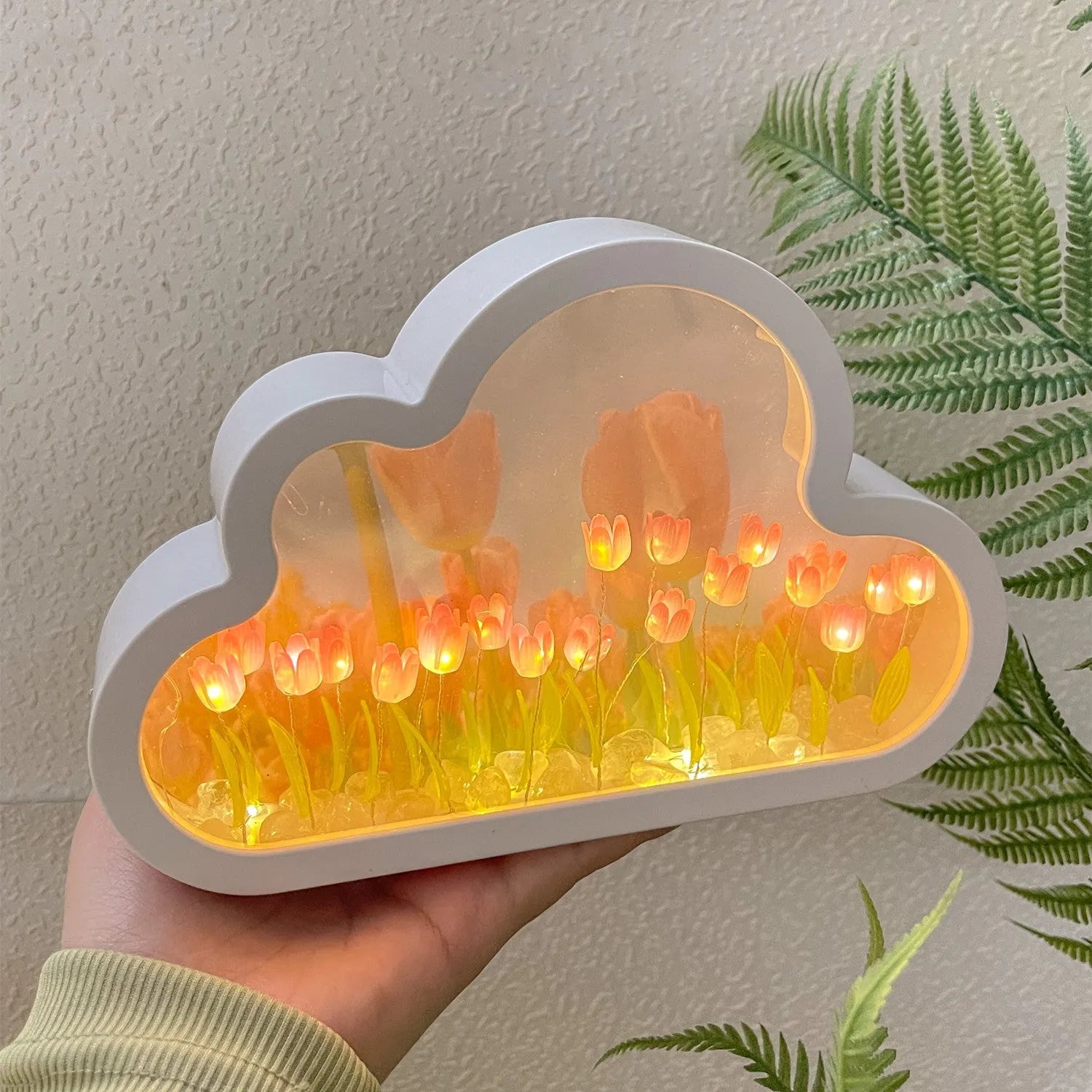 Cloud-shaped tulip night lamp with LED lights and integrated mirror on a table