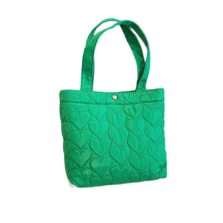 Large capacity women's shoulder bag in Oxford fabric with double-joint straps, bucket shape, and phone pocket.