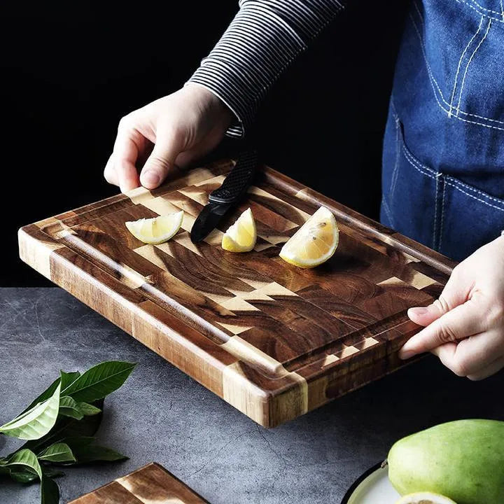 Brown solid wood cutting board with parquet pattern, 3cm thick, on kitchen counter