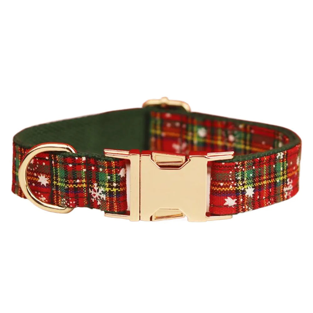 Green snowflake Christmas pet collar set with matching leash, bow, and vest for dogs