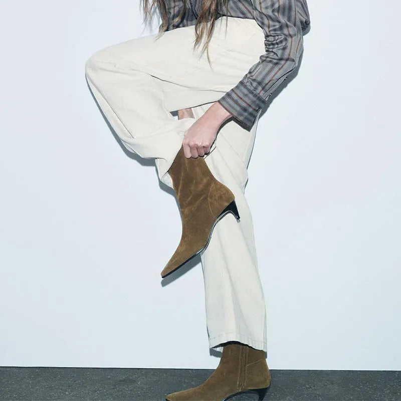 Women's brown square toe ankle boots with a side zipper and a mid-height kitten heel.