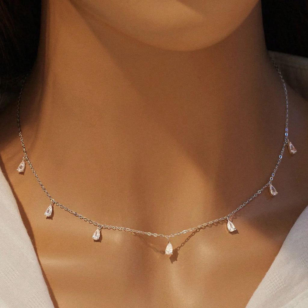 Drop-shaped artificial zircon pendant on an adjustable O-chain necklace in a choice of silver, rose gold, or golden yellow finish.