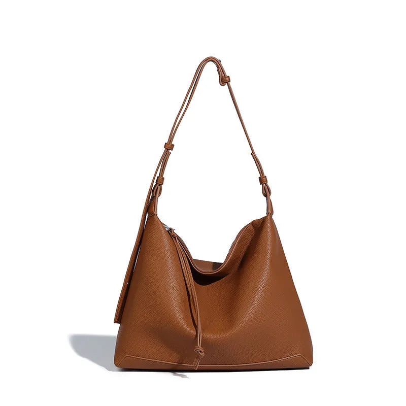 Caramel coloured soft PU messenger bag with underarm shoulder strap