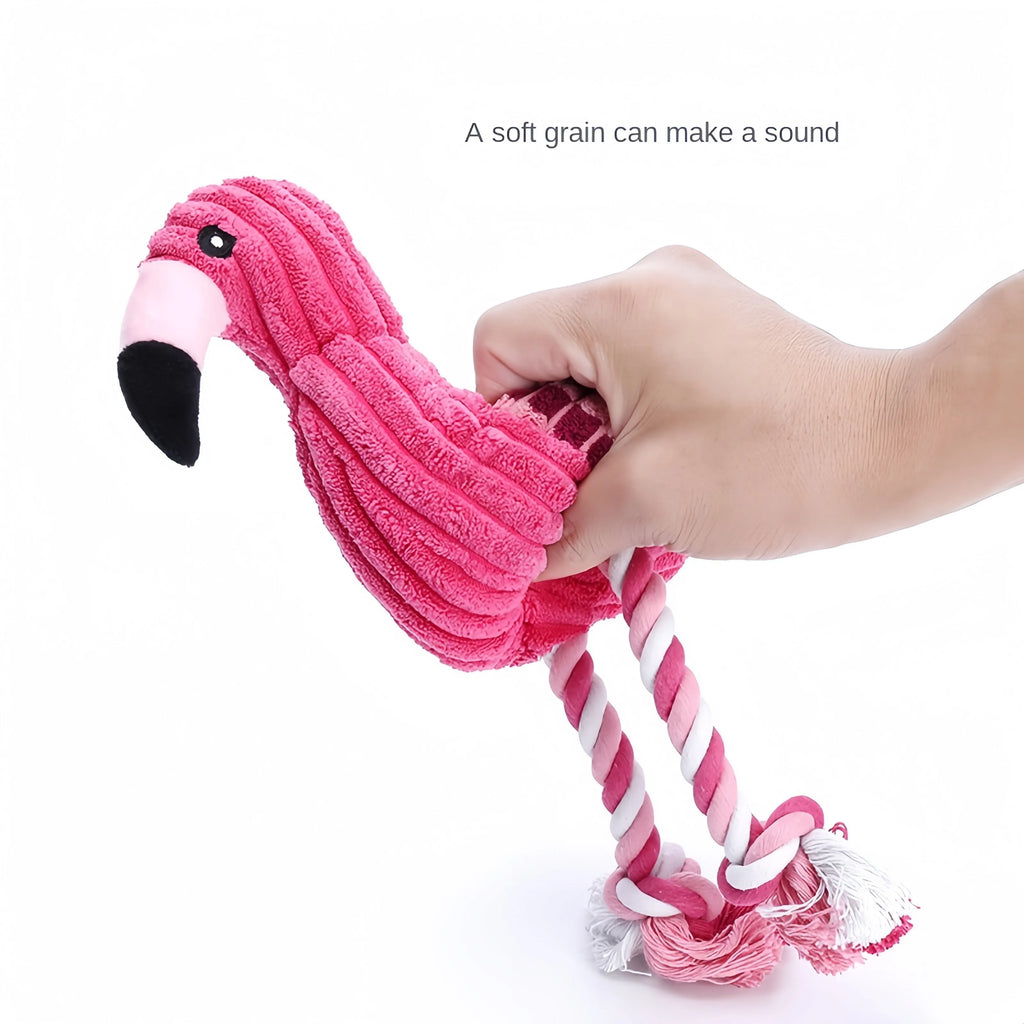 Pink corduroy animal-shaped dog toy with internal squeaker for bite-resistant play.