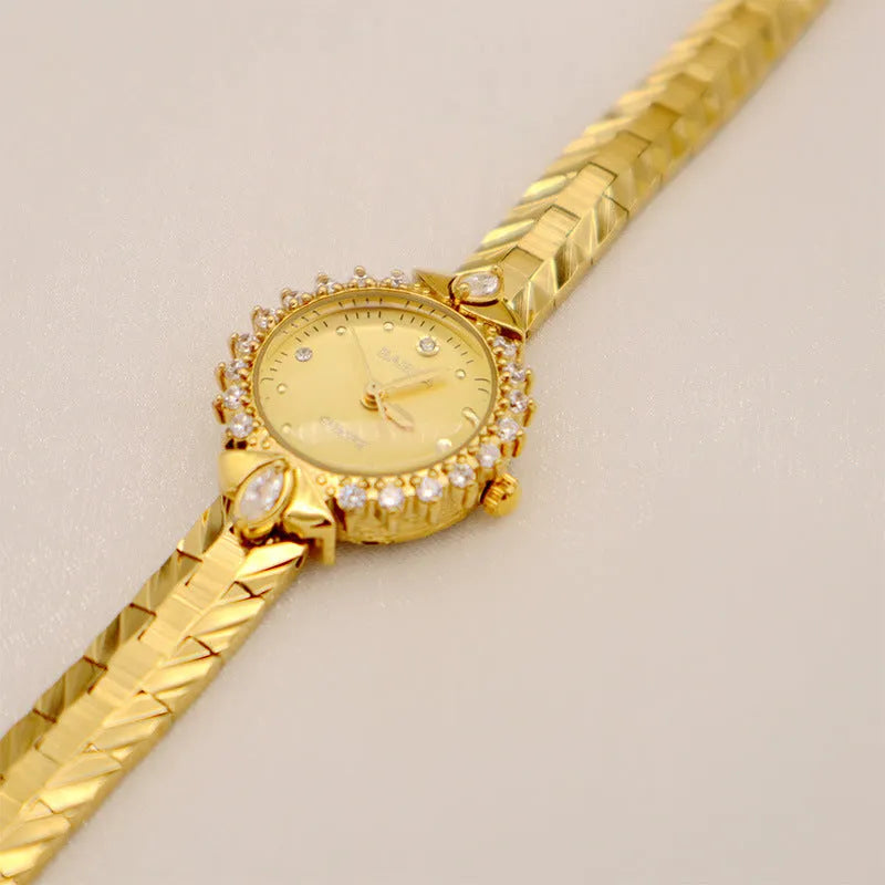 Women's vintage quartz watch with diamond bracelet in gold or white dial option