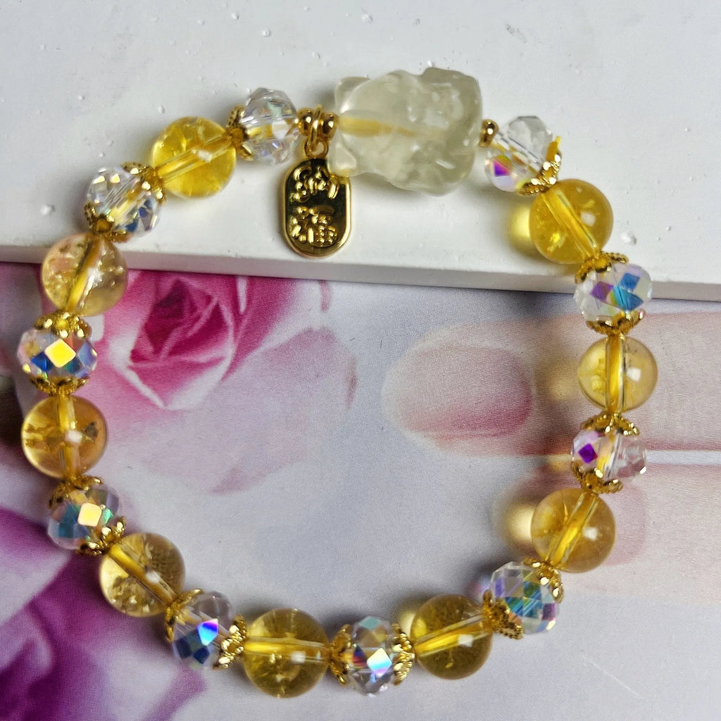 Natural citrine nine-tail fox crystal bracelet for women on a wrist.