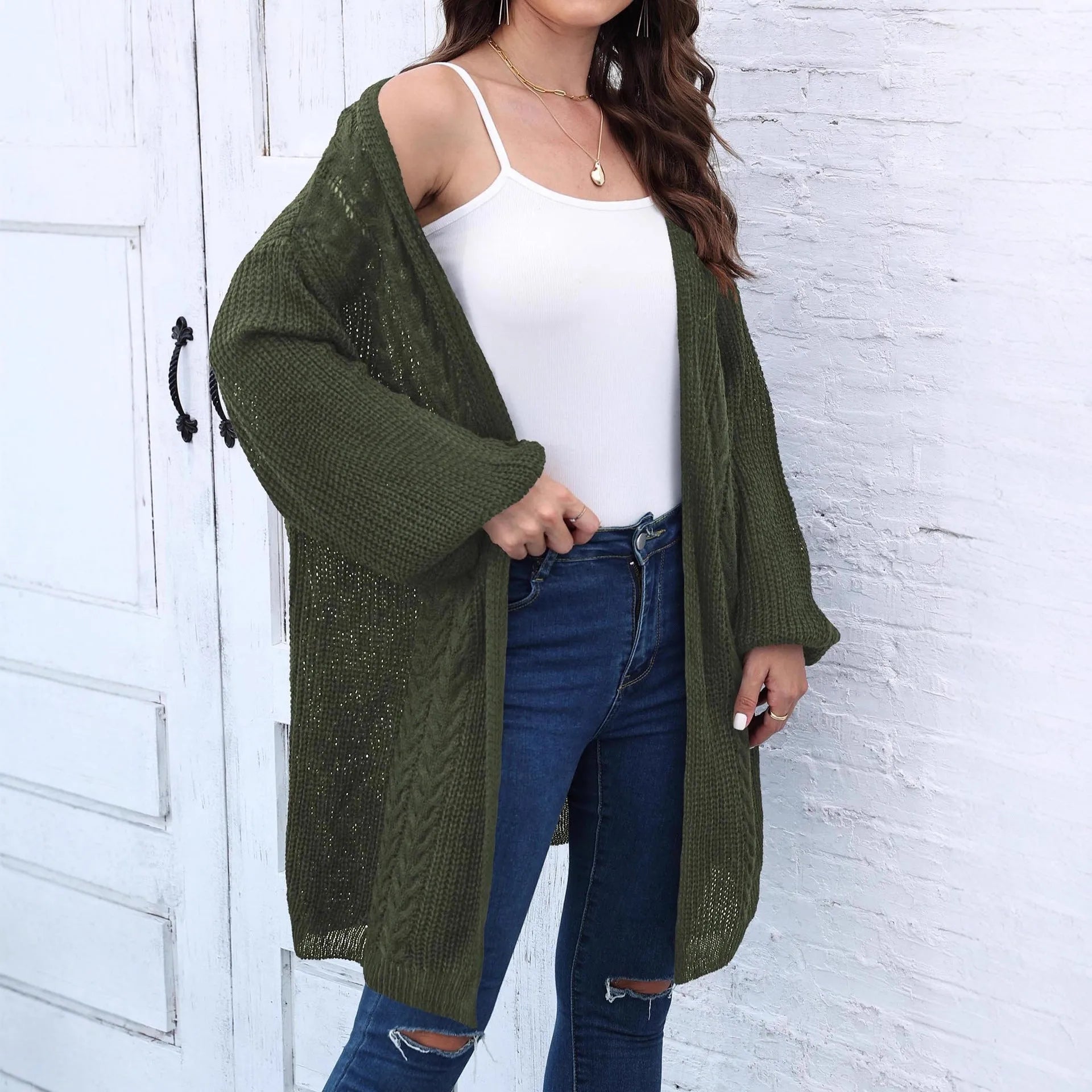 Women's loose-fit solid-colour acrylic sweater coat shown in light grey
