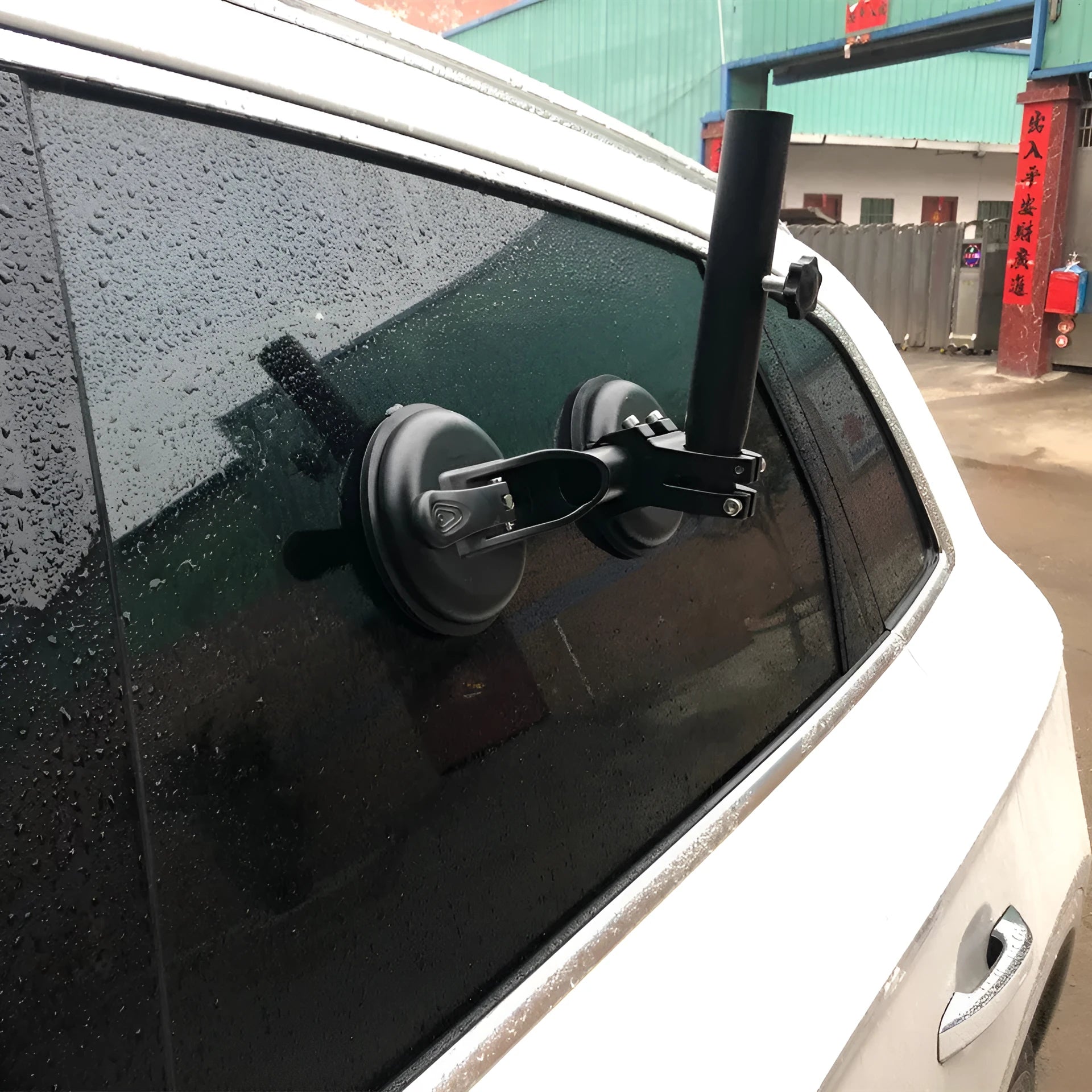 Black off-road car sucker base with round rubber suction cup for mounting on vehicle windows.