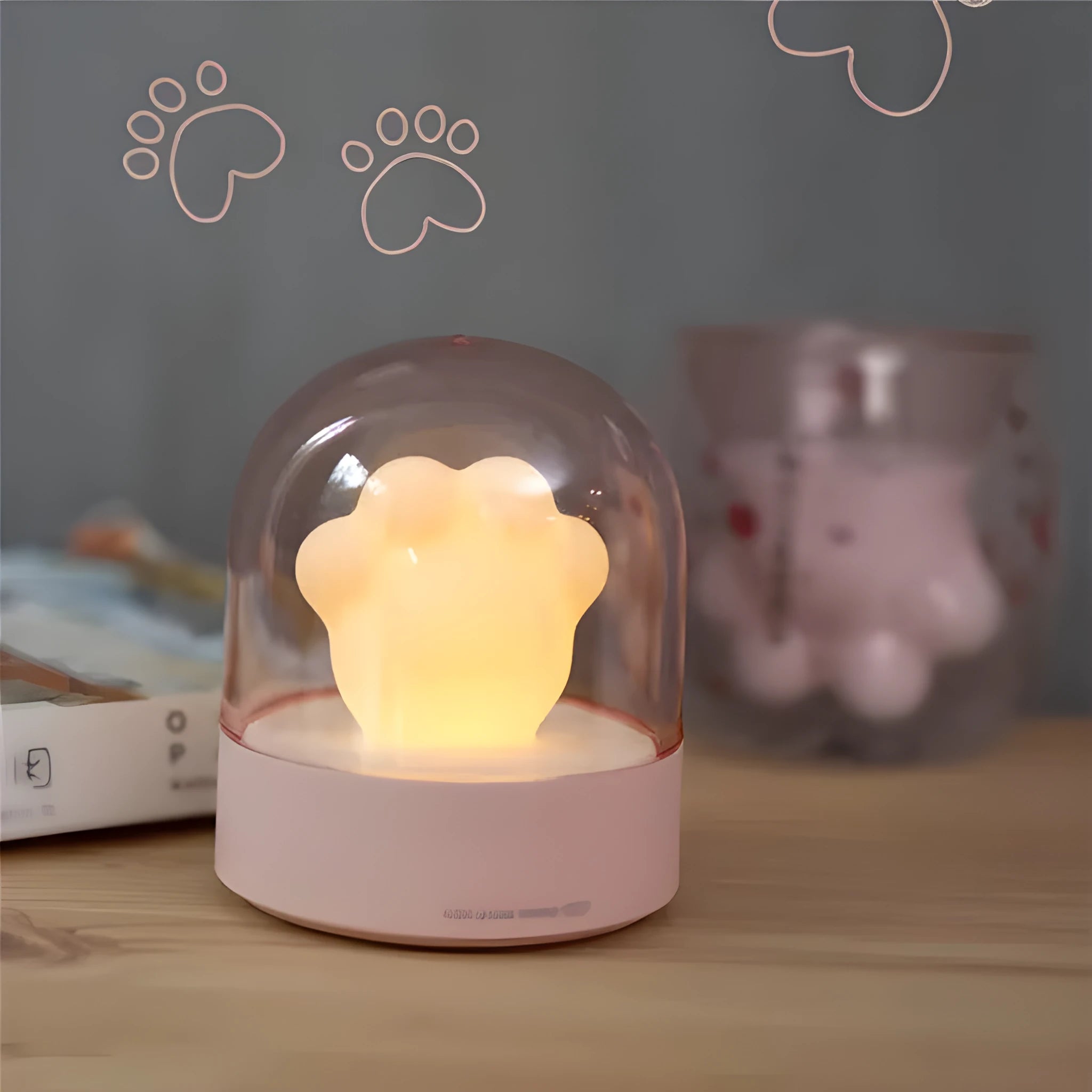 Pink cat paw shaped night light with USB charging cable and music box function